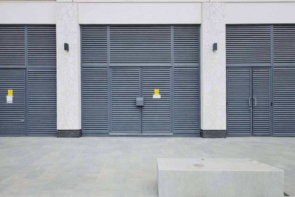 Steel louvre doorset and louvre facade combination on a brick electrical substation