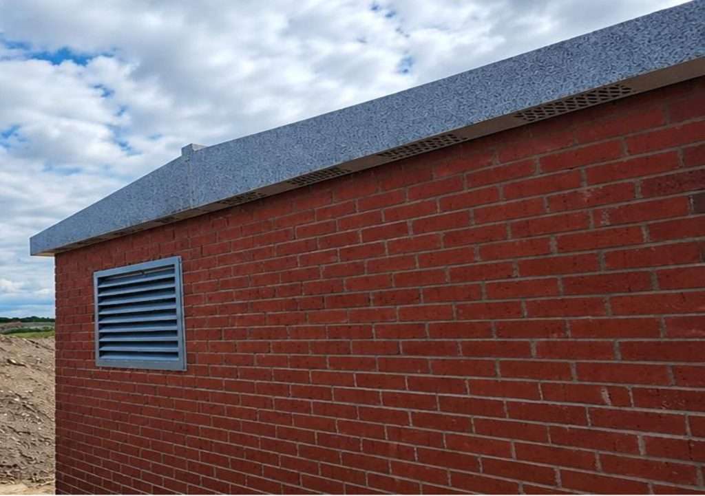 Close-up of a steel roof edge and guttering